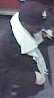 Broken-armed bandit robs Bank of America