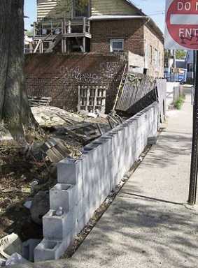 Leaning wall springs nabe into action