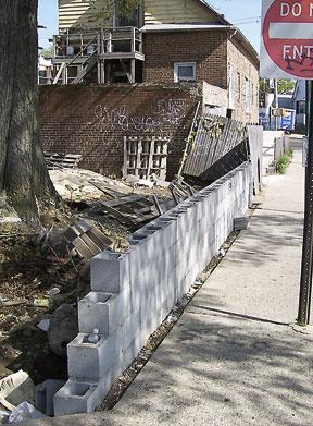 Leaning wall springs nabe into action
