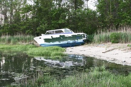 Beached boats continue to burden waterfront nabes