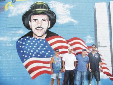 Defaced 9/11 firefighters mural nearly restored