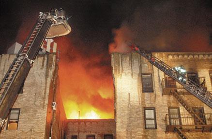 Towering inferno engulfs building