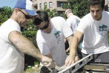 Volunteers give P.S. 73 a massive makeover