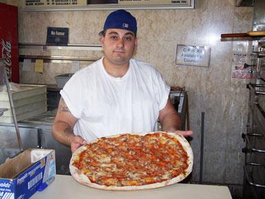 Pizzeria owner braves the recent heat wave