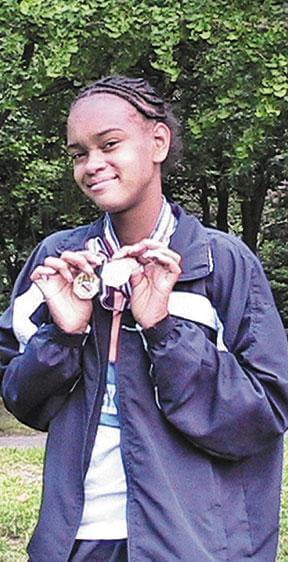 Co-op track star at state games