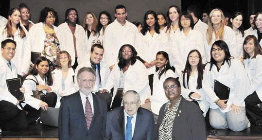 Touro’s Pharmacy Program students receive white coats