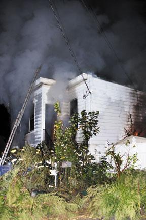 Fire engulfs home