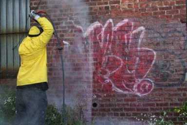 Graffiti cleanup makes Westchester Square shine