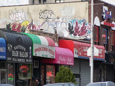 Pelham Bay graffiti faces the brush