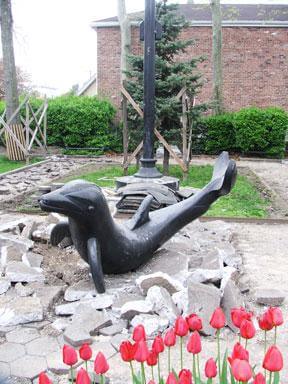 Beloved dolphin statue stays