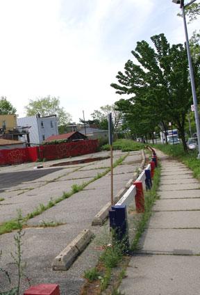 Graffiti on a wooden fence removed by Klein
