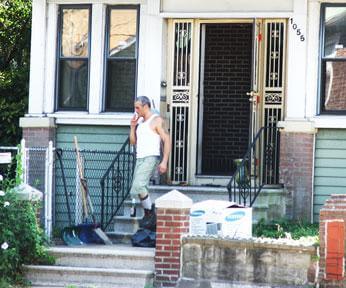 Woman fooled out of house