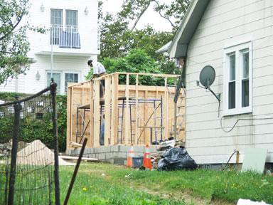 Property owner adds a room without permits