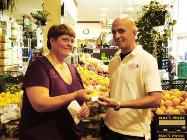 Grocer’s gift cards help needy