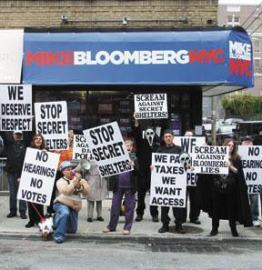 Protest signs raised in defiance to Bloomberg