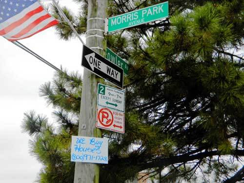 Department of Sanitation removes illegal postings in Community Board 11