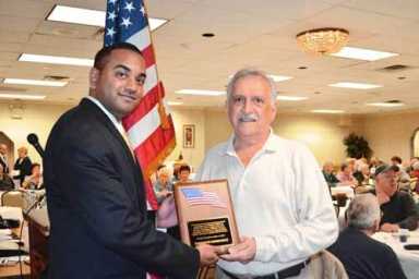 Local AARP chapter receives flag