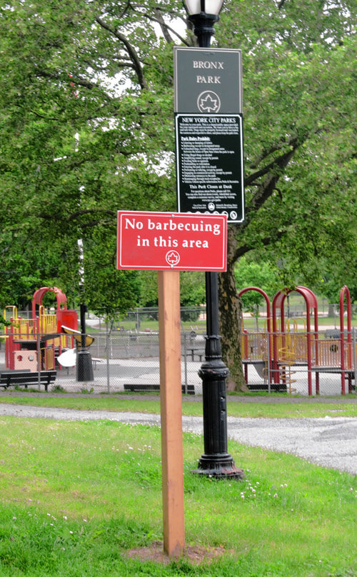 No BBQing signs installed in Bronx Park near Bronx Park East