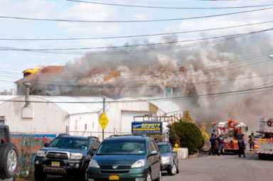 Fire engulfs City Island building|Fire engulfs City Island building