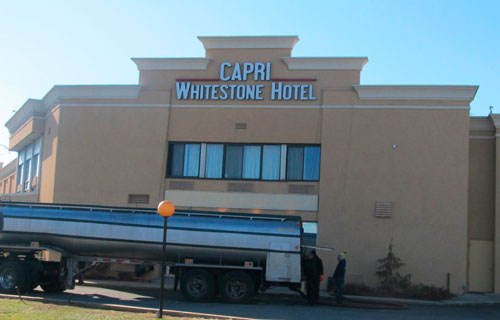 Larger Capri hotel signs removed at Crystal's Place shelter