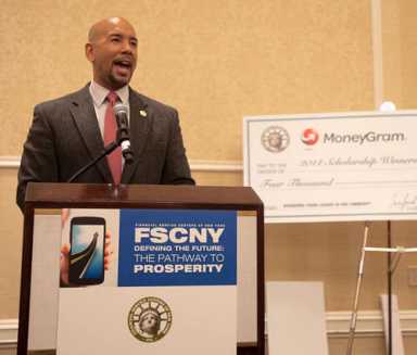 Check cashers’ scholarships to Bronx youth