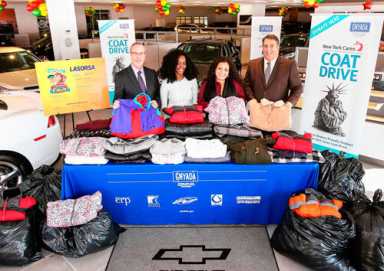Kick off to coat drive at local car dealer