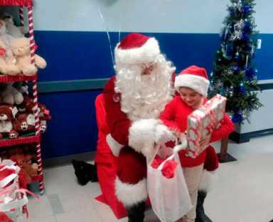 Al’s Angels give gifts to sick children