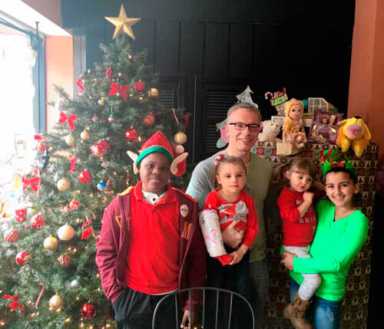 Vacca helps decorate tree trimmings