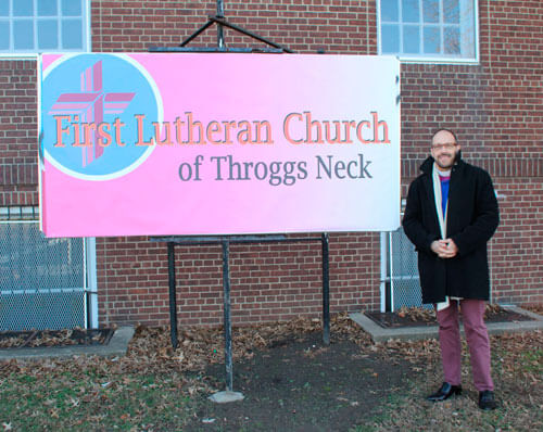 Police officers replace church’s graffitied sign