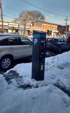 Snow affects bus stops, meters, streets