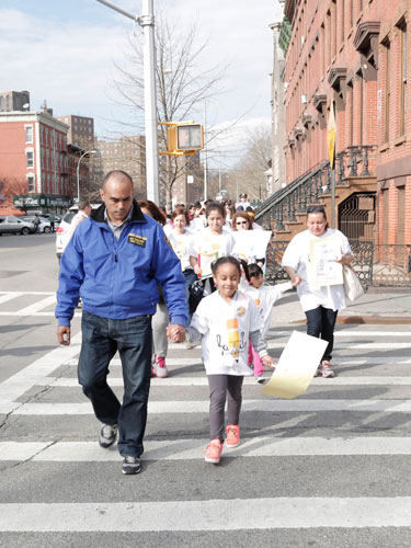 Police, families in Mott Haven safety walk