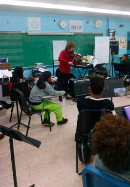 Violinist Alexander Markov performs at Celia Cruz