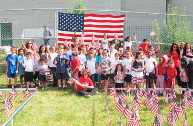 P.S. 304 dedicates Liberty Lawn with American flags for first responders, service personnel|P.S. 304 dedicates Liberty Lawn with American flags for first responders, service personnel