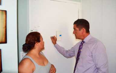 Senator Klein and NIDC install peepholes|Senator Klein and NIDC install peepholes