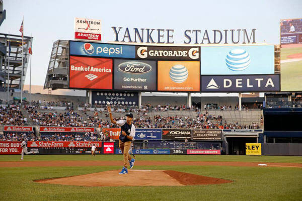 Bronx AT&T Scholar Throws First Pitch At Yankees Game