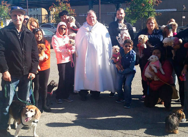 The Blessing Of Live Animals, a tradtional devotion celebrated each year included the blessing of dogs, cats, and fish alike by Reverend David Powers