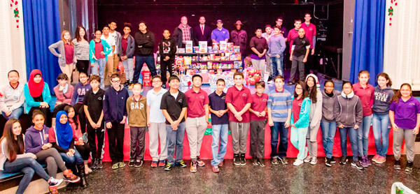 49th Precinct, local schools and community collect thousands of pounds of food|49th Precinct, local schools and community collect thousands of pounds of food