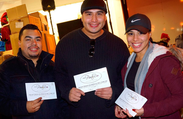 Made In Puerto Rico hands out food at TN Tree Lighting