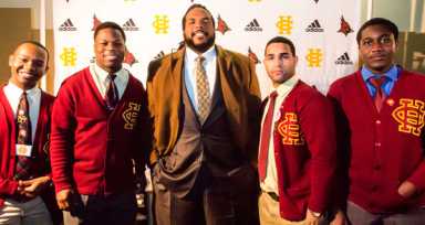 Cardinal Hayes receives award from NY Jet Willie Colon|Cardinal Hayes receives award from NY Jet Willie Colon