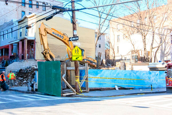 Windstorm causes two buildings to collapse