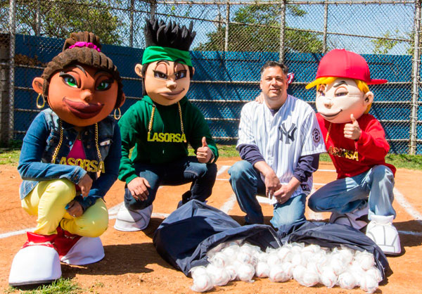 Automotive group donates baseballs to little league