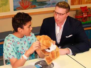 NFL’s Joe Kowalewski Visits CHAM Patients