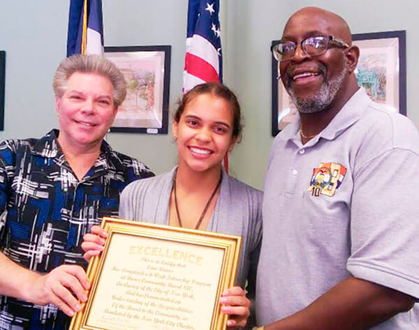 Community Board 10 youth intern honored