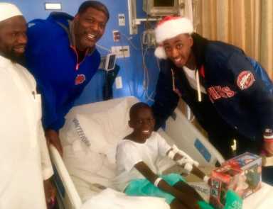 Basketball players visit Montefiore children