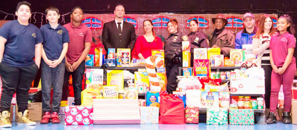 49th Precinct Holiday Food Drive celebrates another successful year feeding the needy|49th Precinct Holiday Food Drive celebrates another successful year feeding the needy