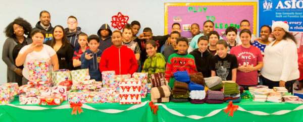 Run2Live, Jackson family donates gifts to Astor children at P.S. 352