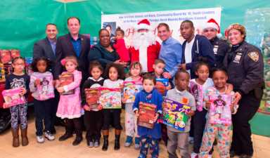 Senator Jeff Klein has toy distribution in Throggs Neck for holidays