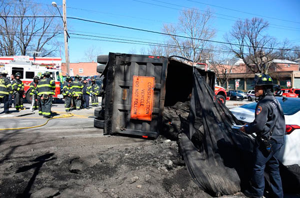 Repave Inc. Truck Overturns In Wakefield