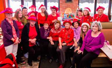 Bronx Red Hat Roses donates toys to Engine 89/Ladder 50 drive