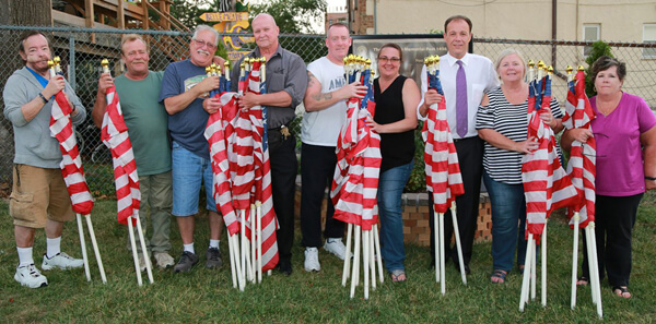 Electeds Donate Flags For Vets’ Day Parade